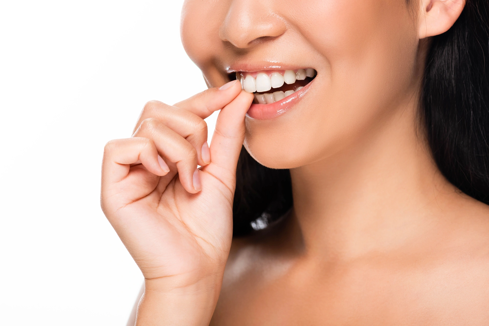 Woman-loving-her-teeth-after-seeing-a-cosmetic-dentist-in-McLean