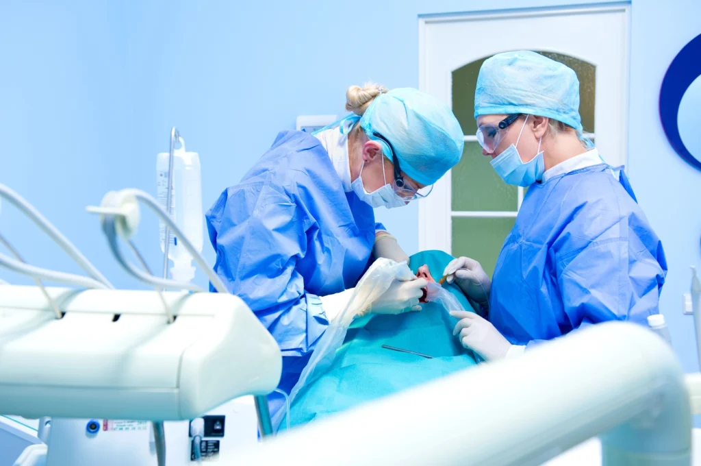 two dental surgeons installing dental implants in McLean