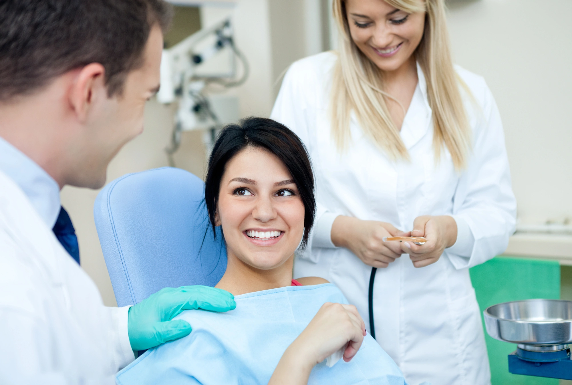 Female-patient-talking-to-a-cosmetic-dentist-in-McLean