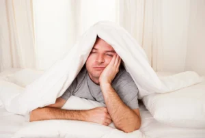 tired man due to sleep apnea in Arlington tired man due to sleep apnea in Arlington