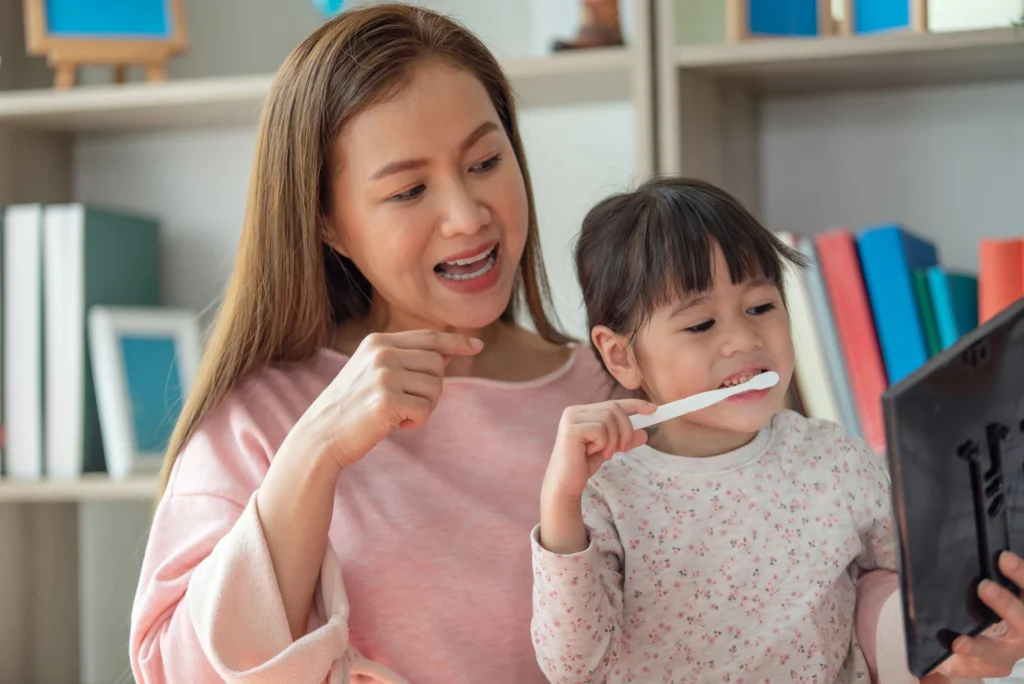 mom and daughter after going to a family dentist near McLean VA