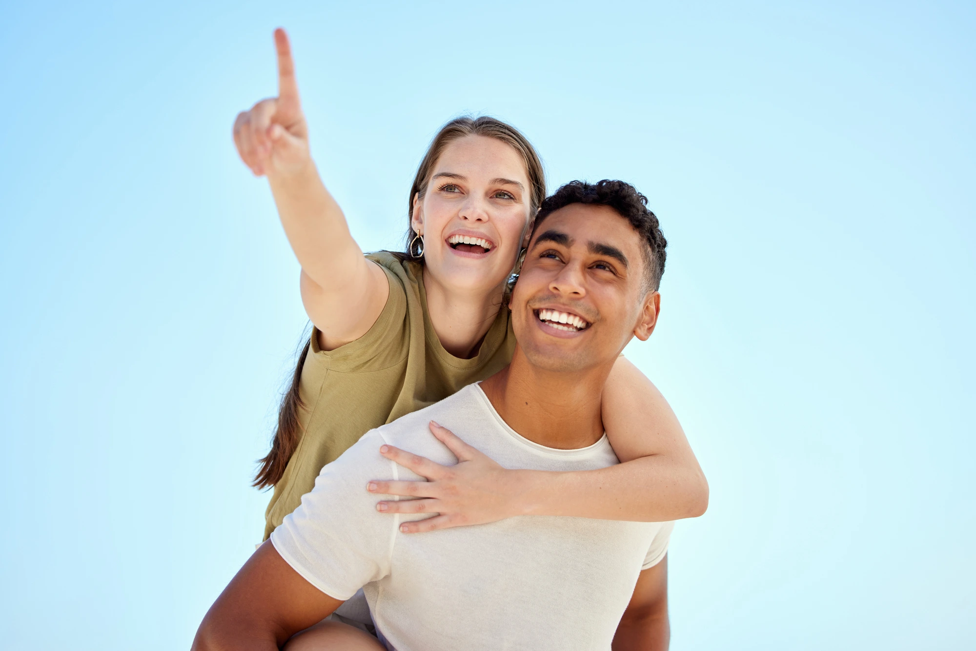 happy couple after getting dental implants near me