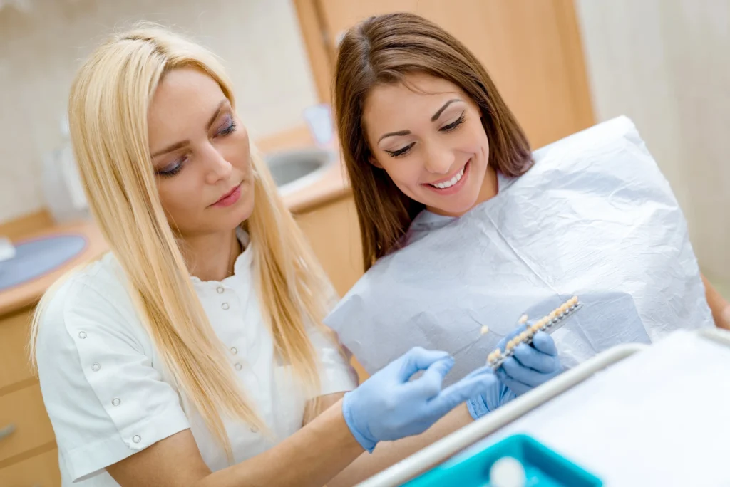 dentist explaining affordable dental crowns in McLean
